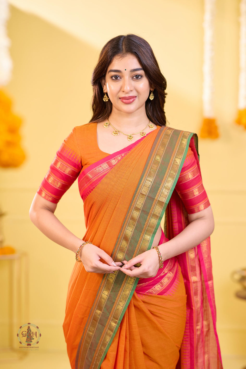 Vibrant Orange Ganga Jamuna Triple Border Kanchi Cotton