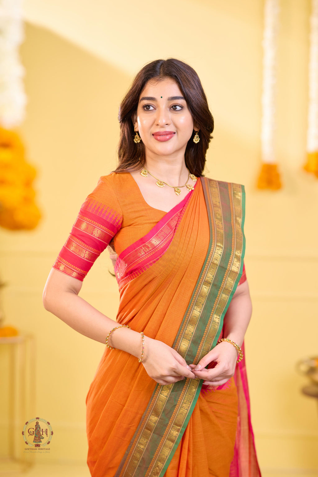 Vibrant Orange Ganga Jamuna Triple Border Kanchi Cotton