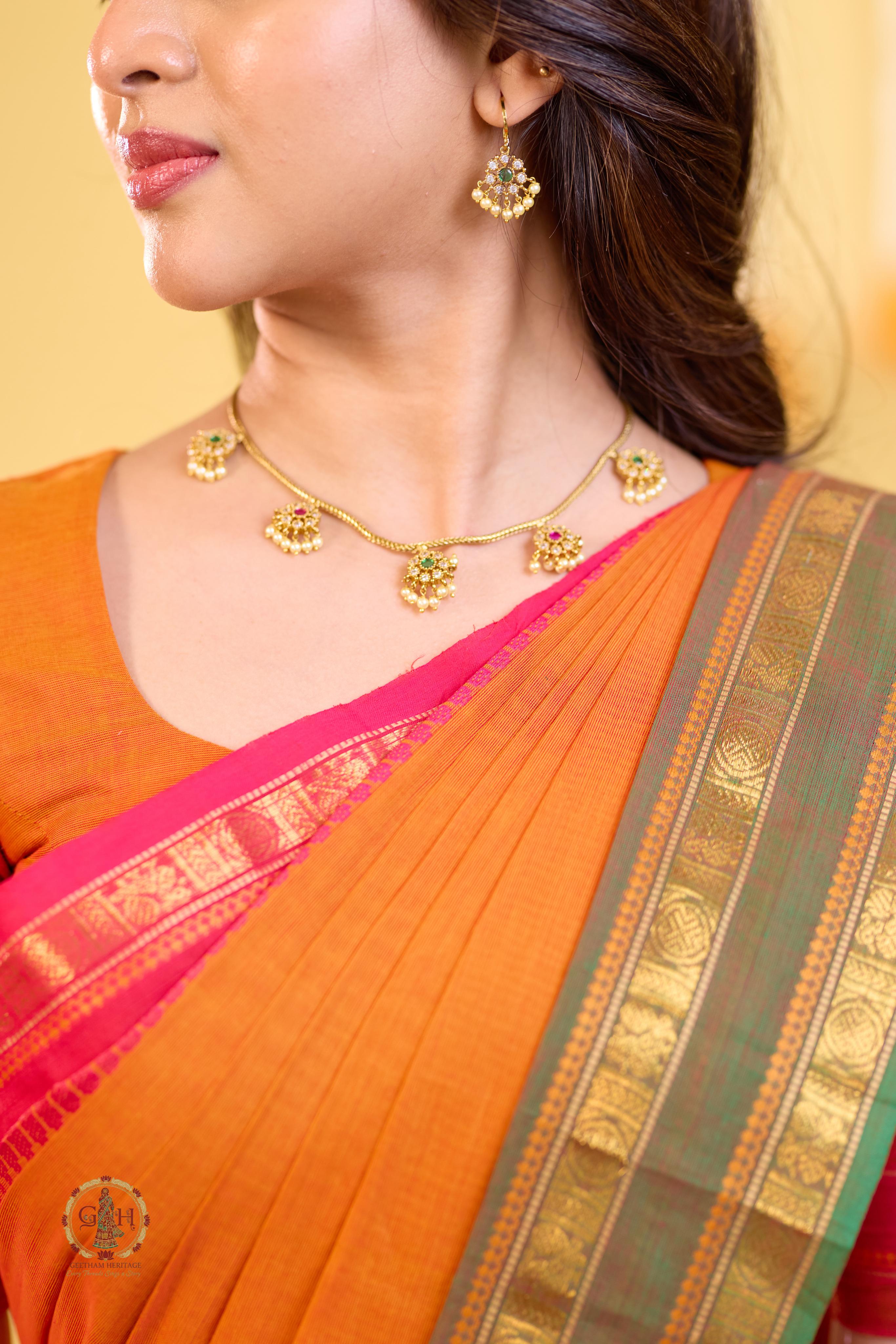 Vibrant Orange Ganga Jamuna Triple Border Kanchi Cotton