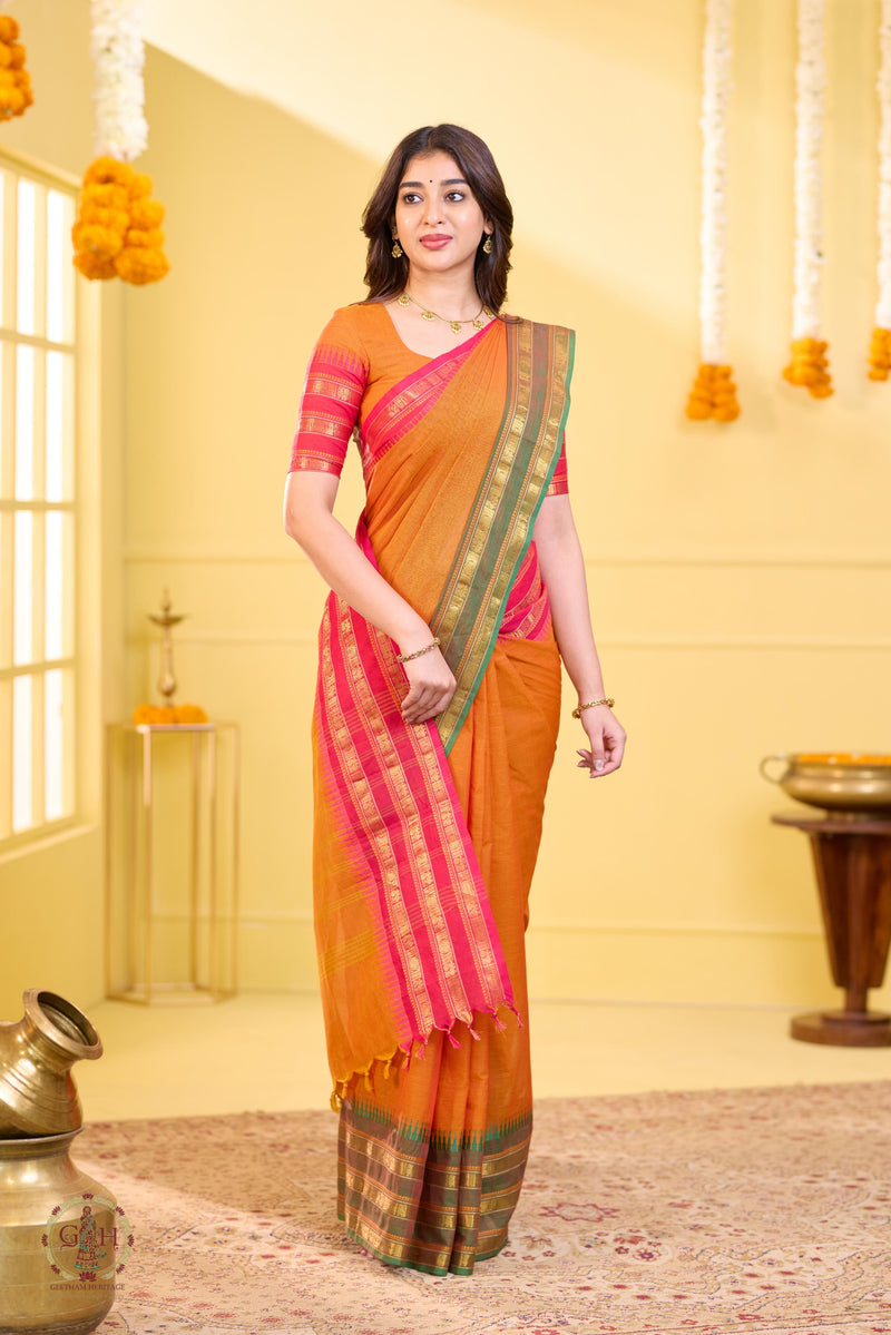 Vibrant Orange Ganga Jamuna Triple Border Kanchi Cotton